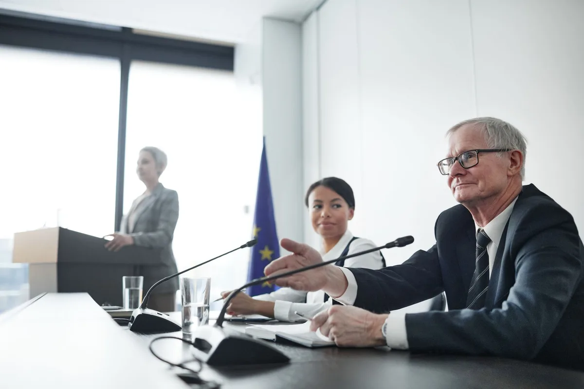 EU officials discuss enlargement strategy and regional cooperation in a formal setting
