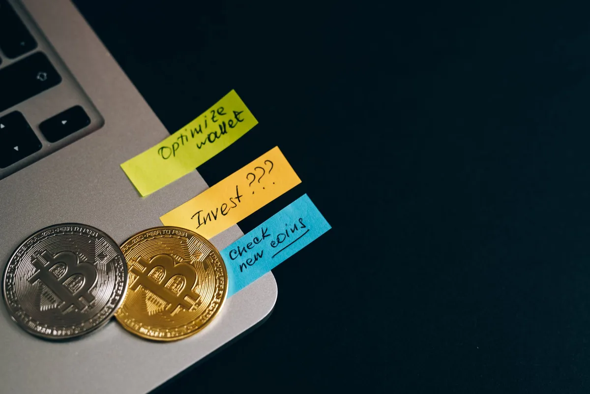Stacks of digital gold and silver coins representing in-game currency rewards