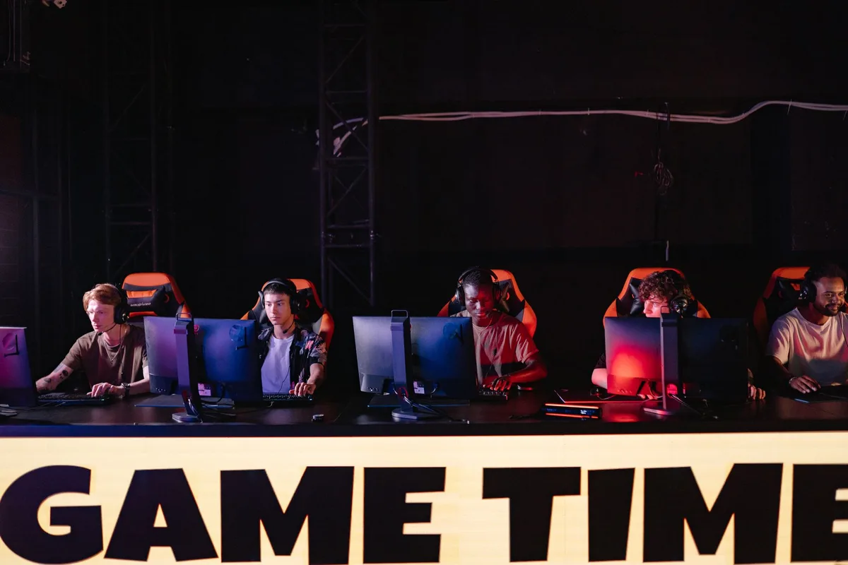 Digital referral link and coins displayed on a mobile gaming screen with celebration elements