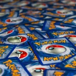 Hands opening trading card packs during a live stream box break event