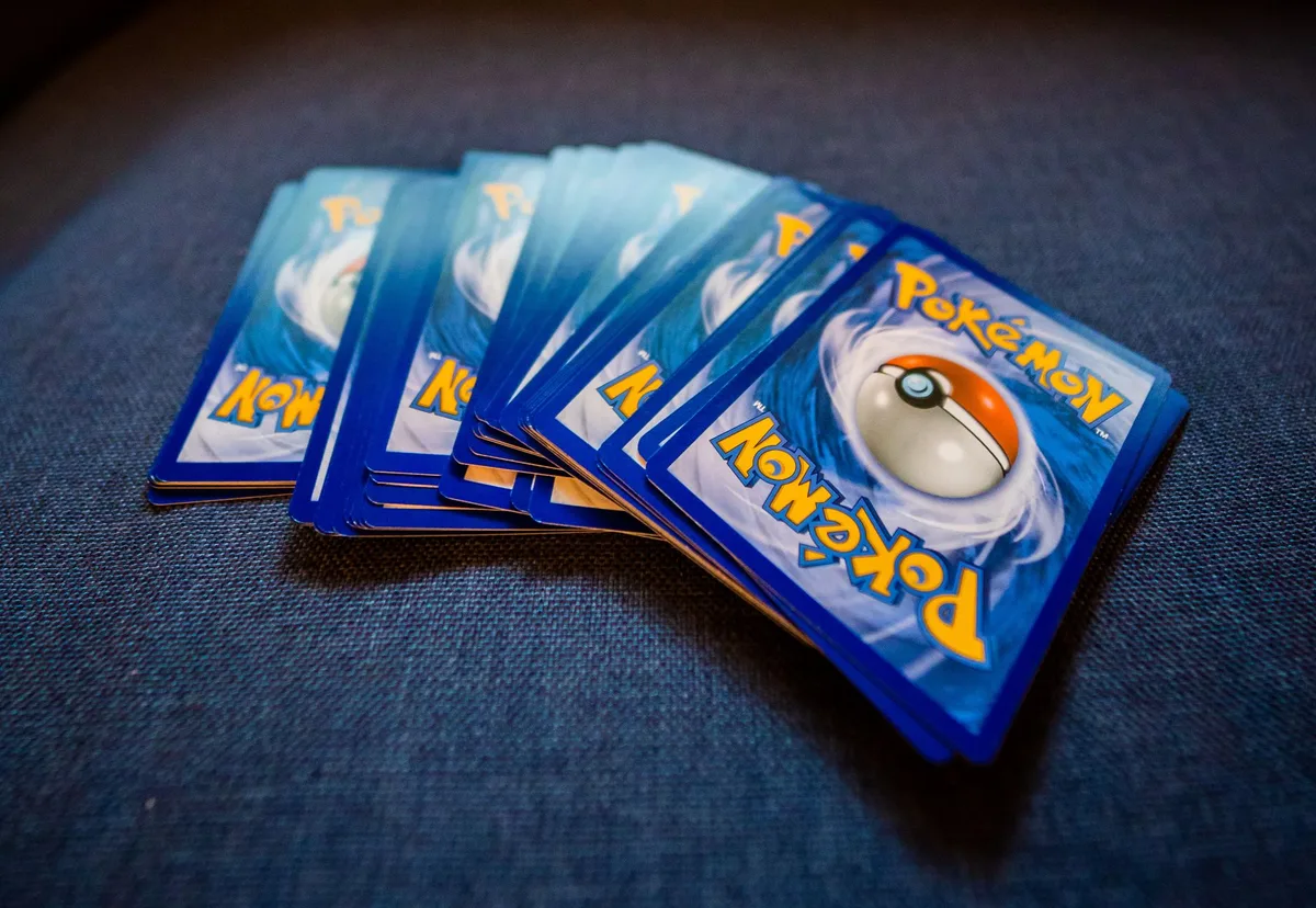 Host opening NFL card packs during a live online break session