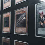 Colorful trading cards fanned out under bright lighting