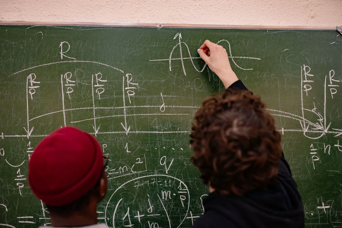 Diagram showing the factors and mathematical properties of 165