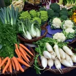Empty market stall with overturned crates and scattered grain sacks symbolising food shortages