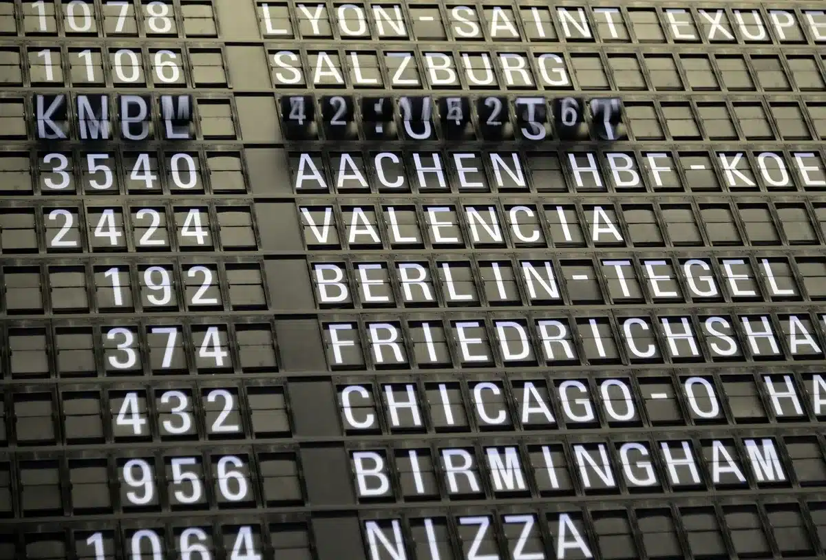 Betting odds board showing changing lines for a football game