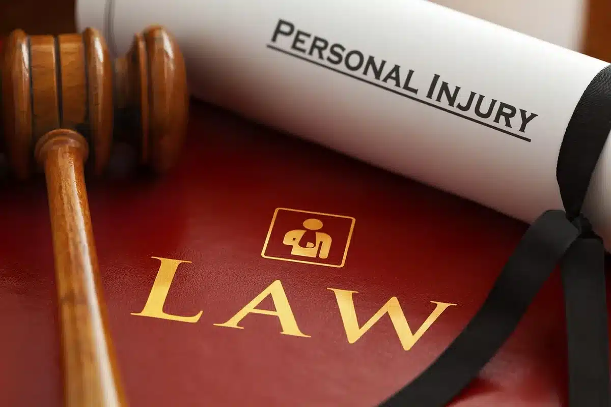 Gavel beside a laptop showing legal documents about gambling regulation